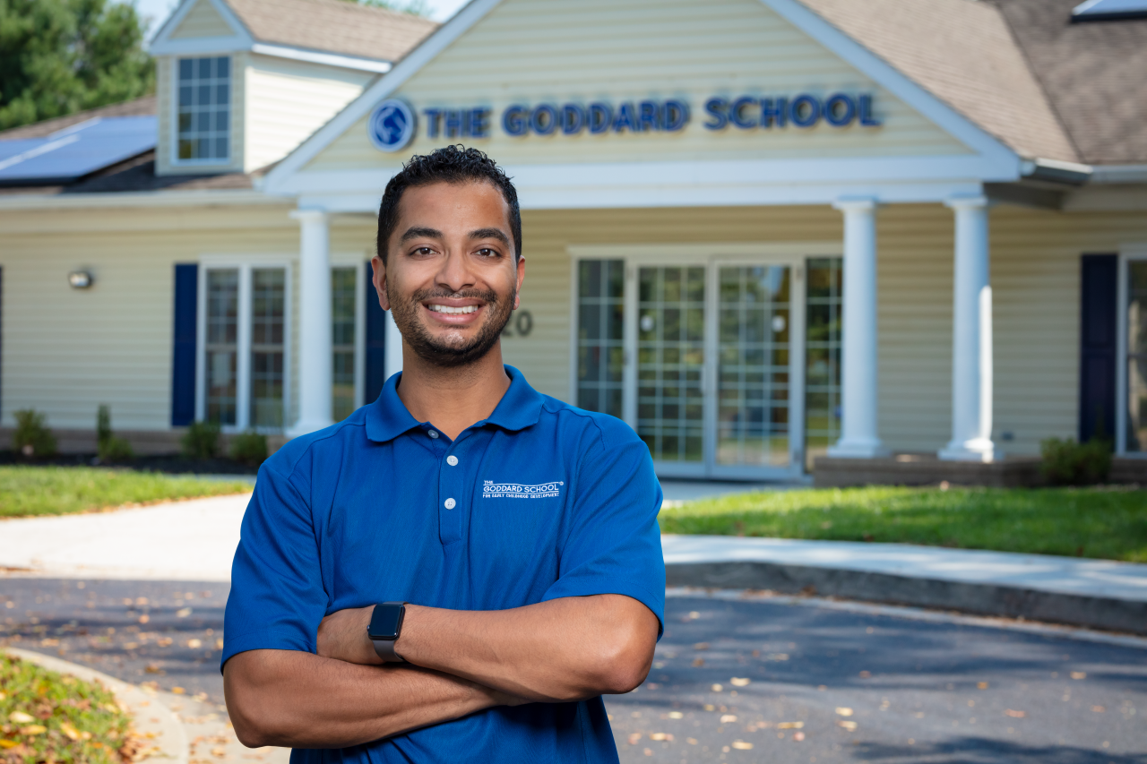 Franchisee in front of school